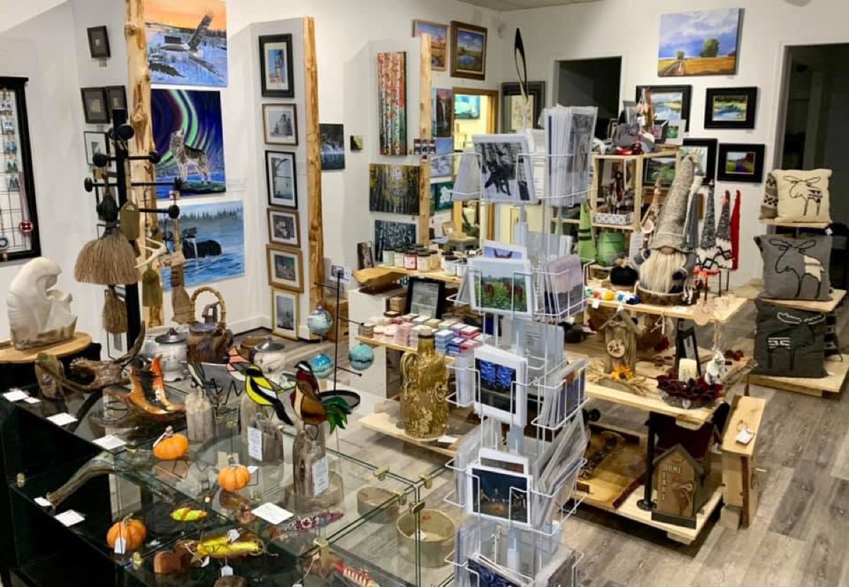 Framed paintings on the gallery walls at On the Avenue