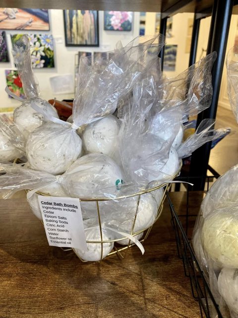 Basket of handmade cedar bath bombs