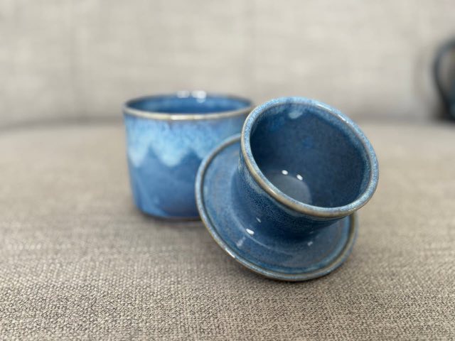 Blue glazed cups and dishes