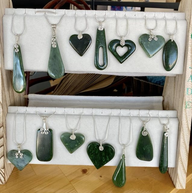 Wall of handmade jade pendant necklaces