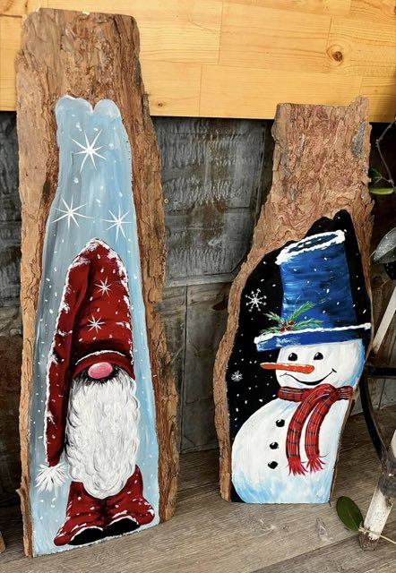 Two hand-painted live-edge wood slabs