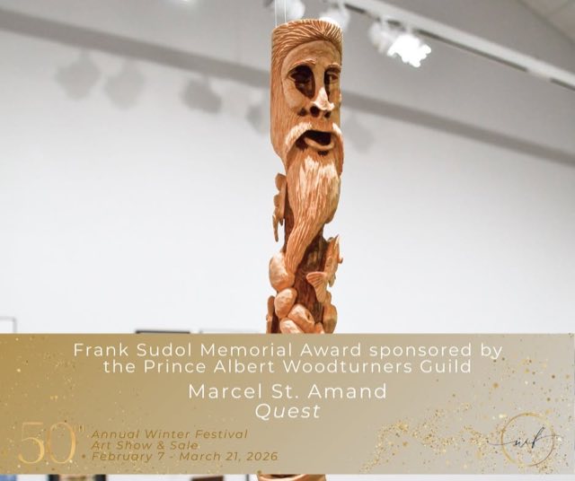 Quest, a carved wood figure by Marcel St. Amand